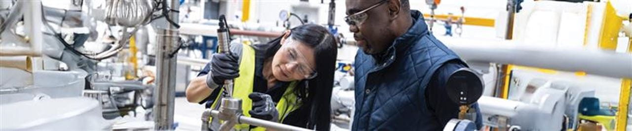 Engineers fixing components