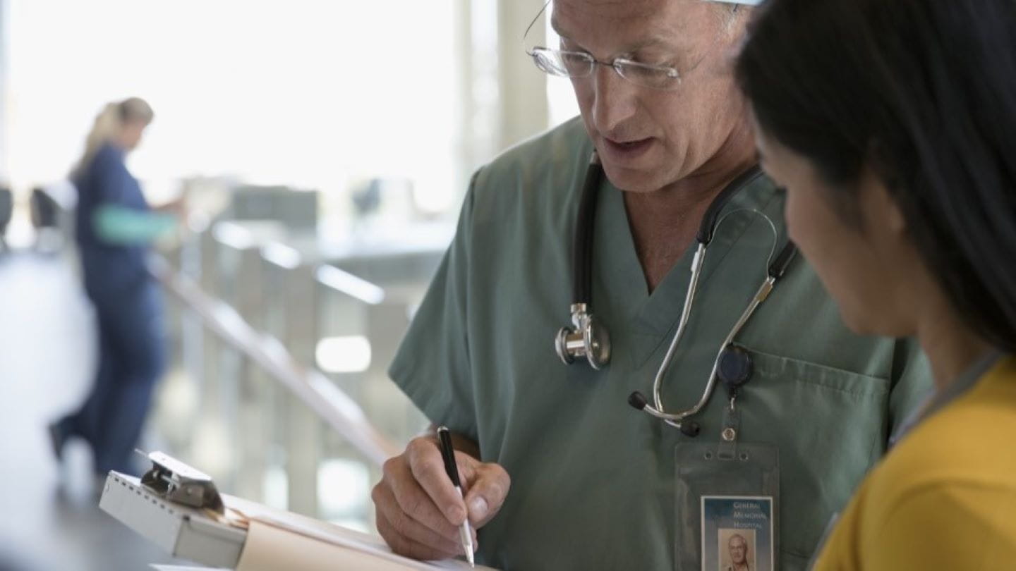 Nurse attending to a patient