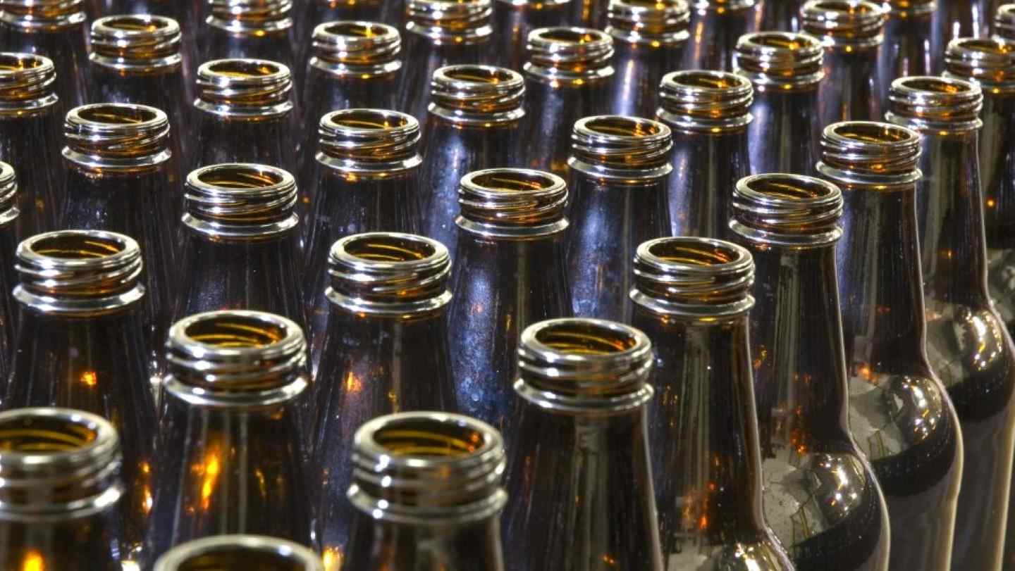 Rows of sterile empty bottles ready to be filled with beer