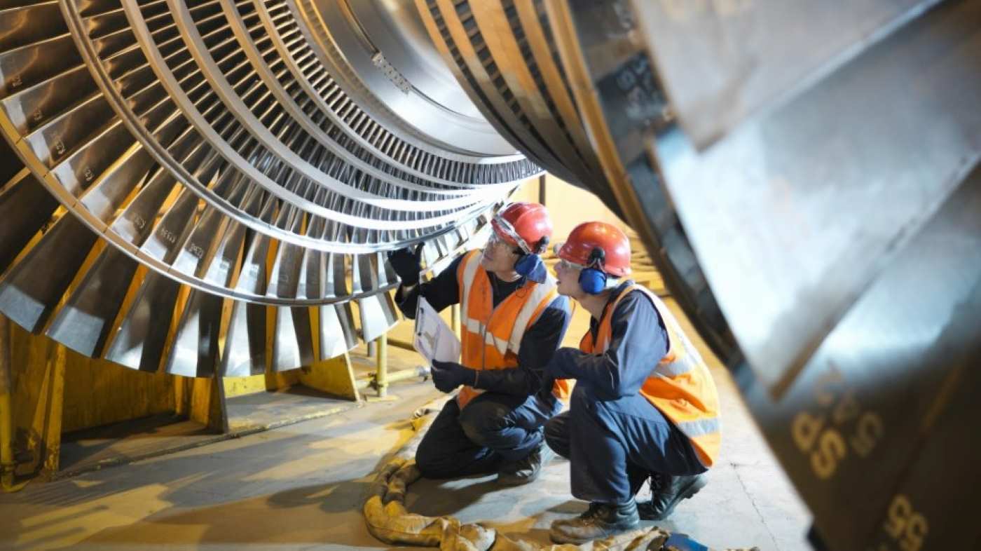 Spirax Sarco engineer reviewing power production turbine