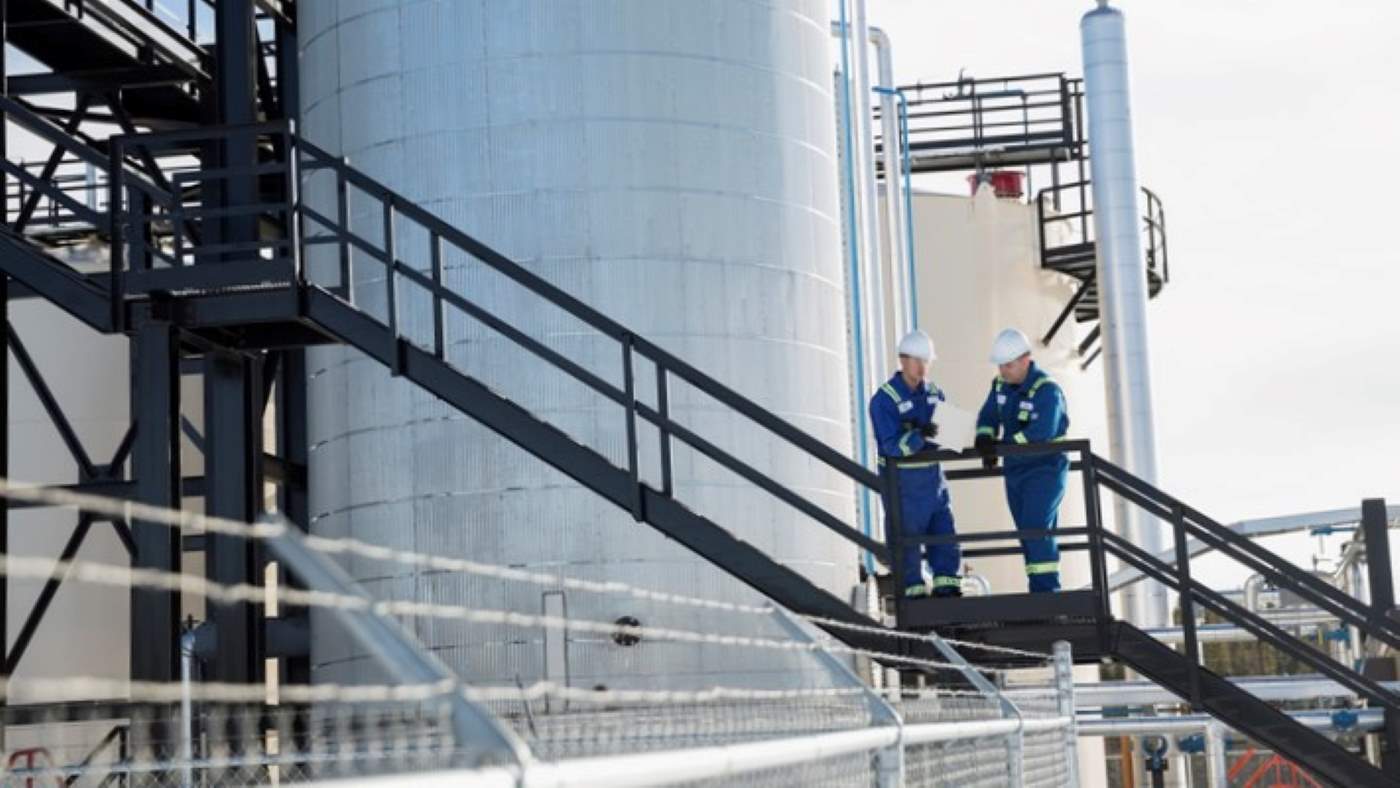 Engineers outside plant