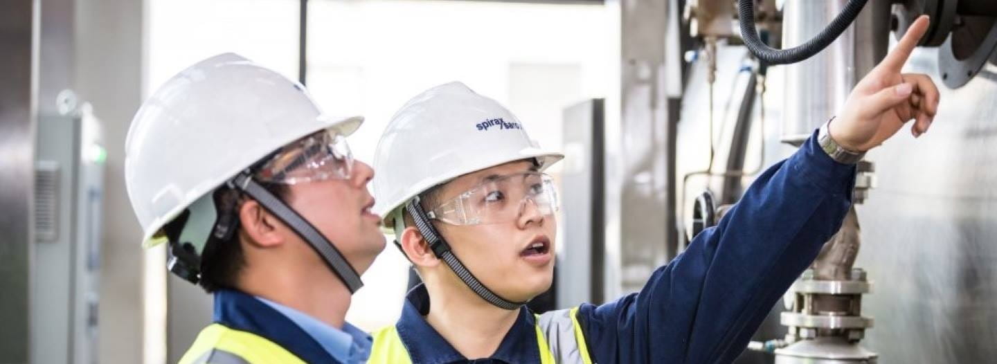 Spriax Sarco engineers inspecting equipment