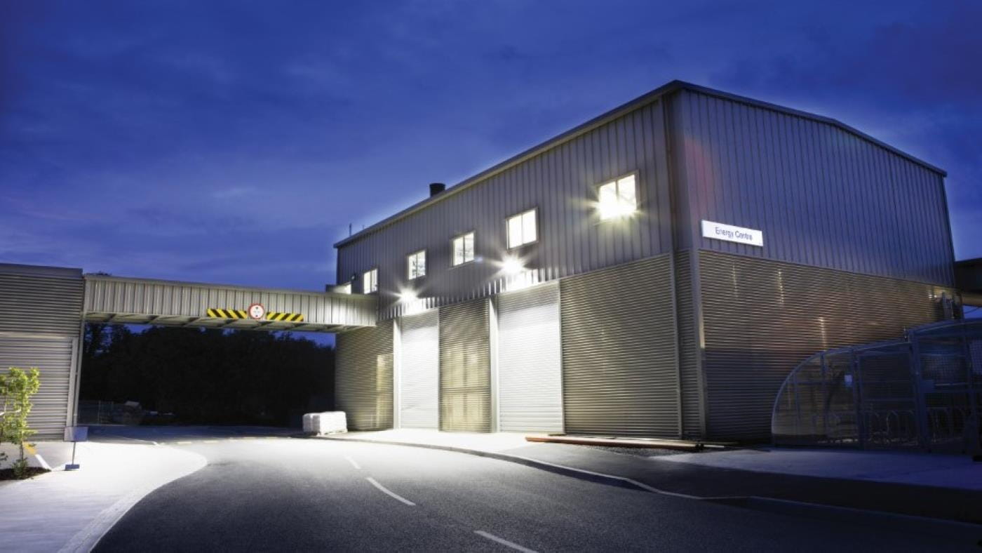 Building at night with lights on
