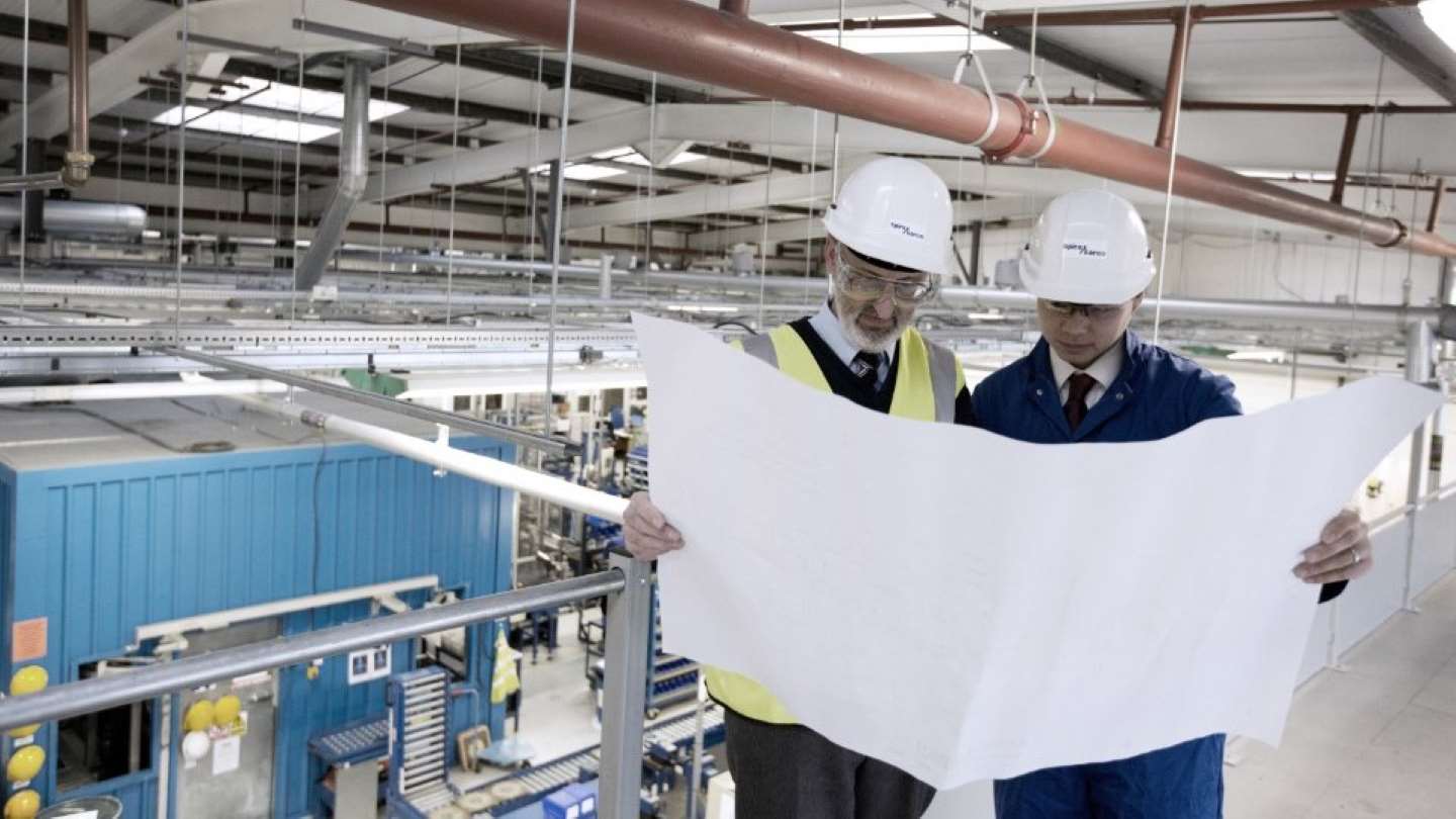 Spirax Sarco engineers viewing large plans